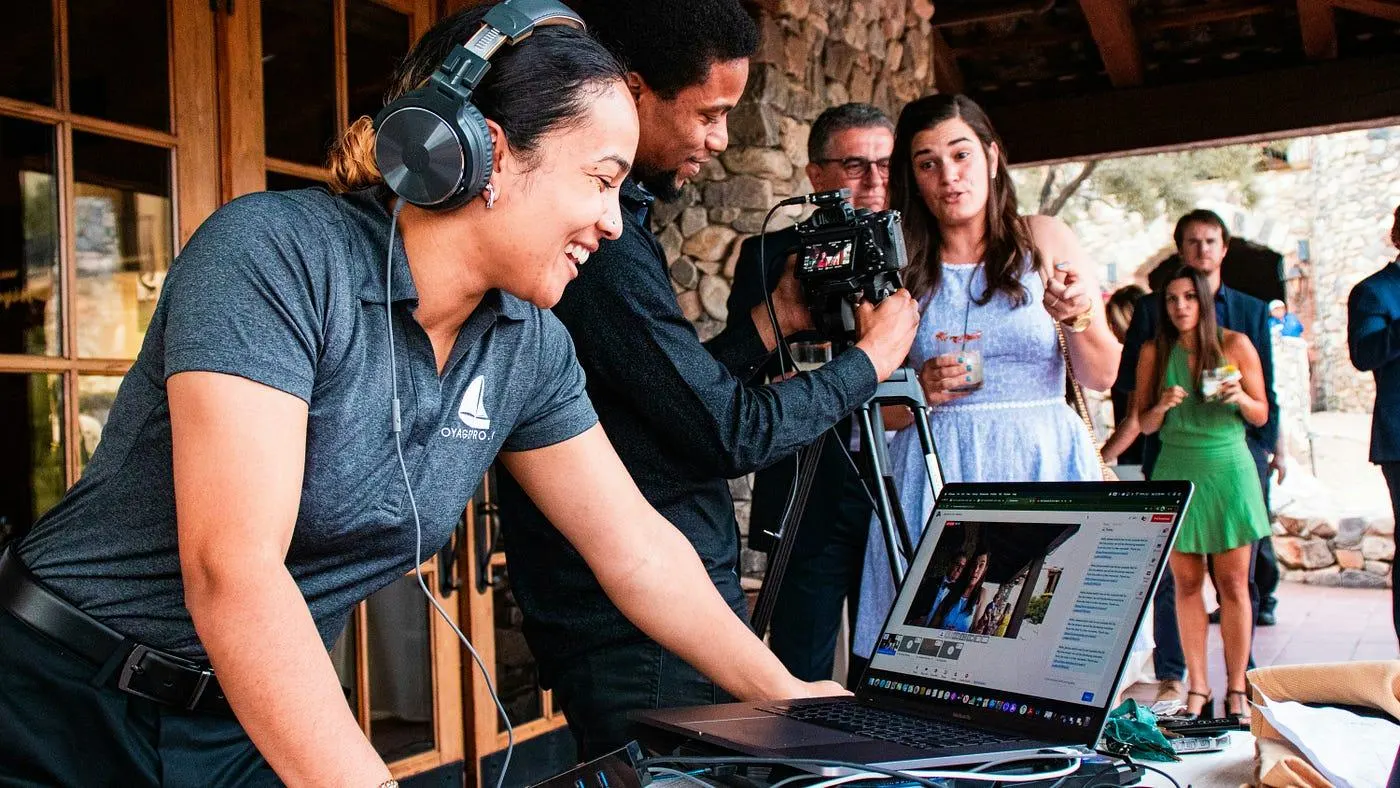 Videographer delivering edited event video in real time during a Nairobi event.
